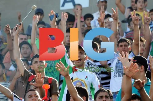 Palestinians Wave Flags During Soccer Match