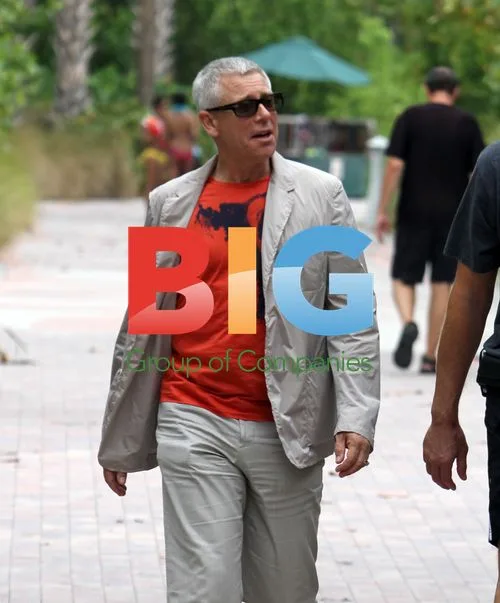 Adam Clayton Strolls on Miami Beach