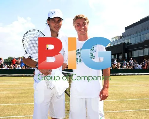 Liam Broady and Rafa Nadal at Wimbledon