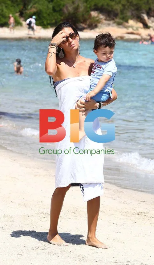 Elisabetta Gregoraci and son on beach