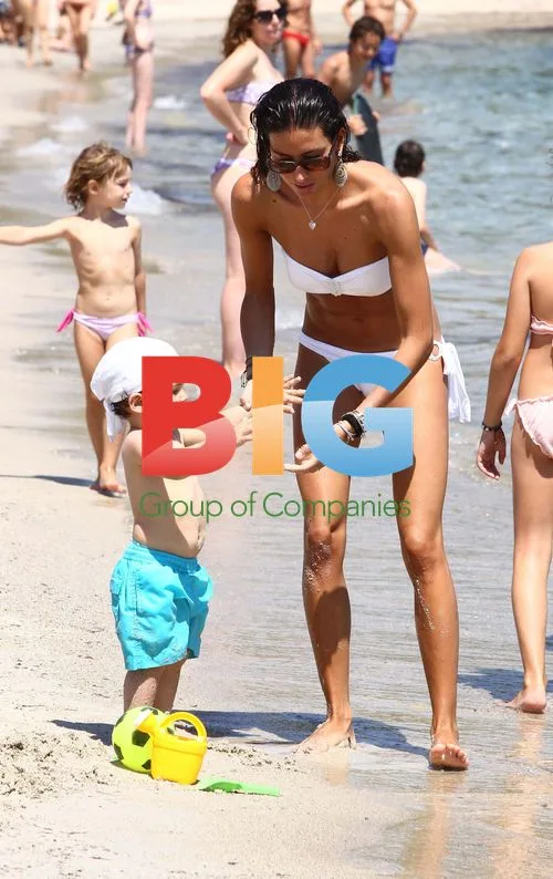 Elisabetta Gregoraci with son on beach