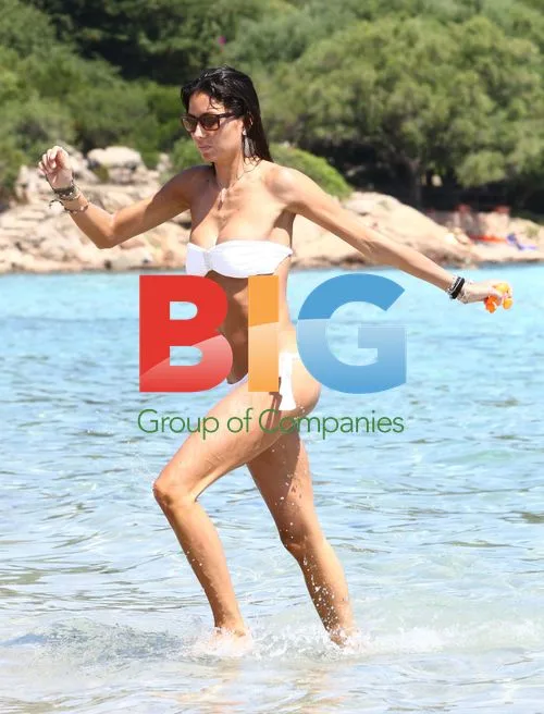 Elisabetta Gregoraci and son on beach