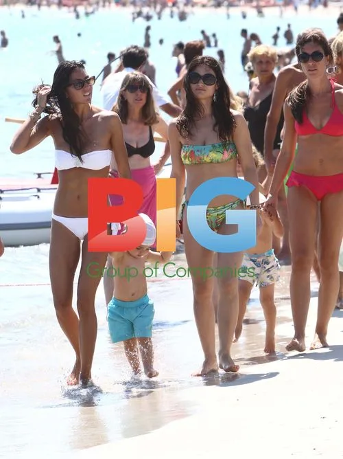 Elisabetta Gregoraci and son on beach