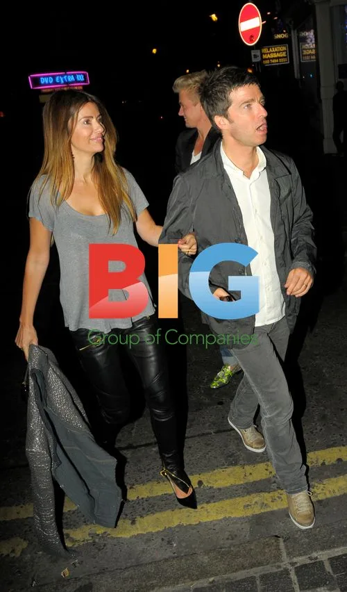 Noel Gallagher and wife out in Soho, London