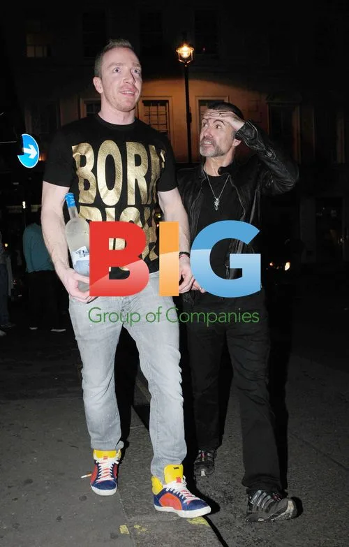 George Michael with friend in London