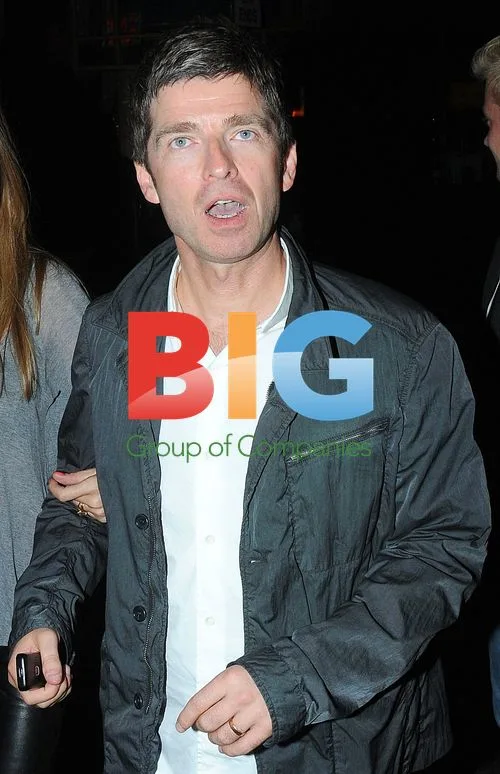 Noel Gallagher and wife Sara out in London