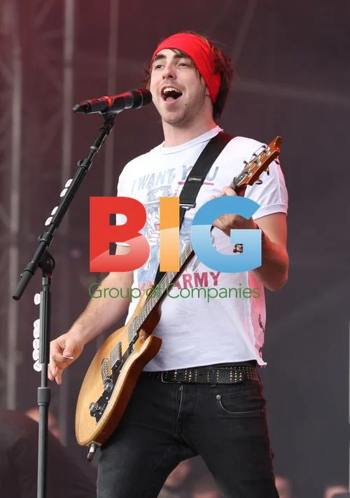 Alexander Gaskarth of All Time Low on stage