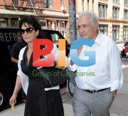 Dominique Strauss-Kahn and Anne Sinclair Return Home