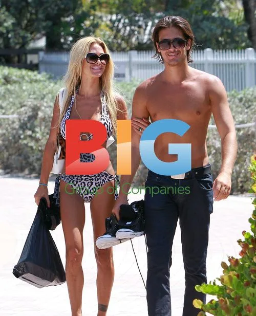 Playmate Shauna Sand and Husband Vacation in Miami
