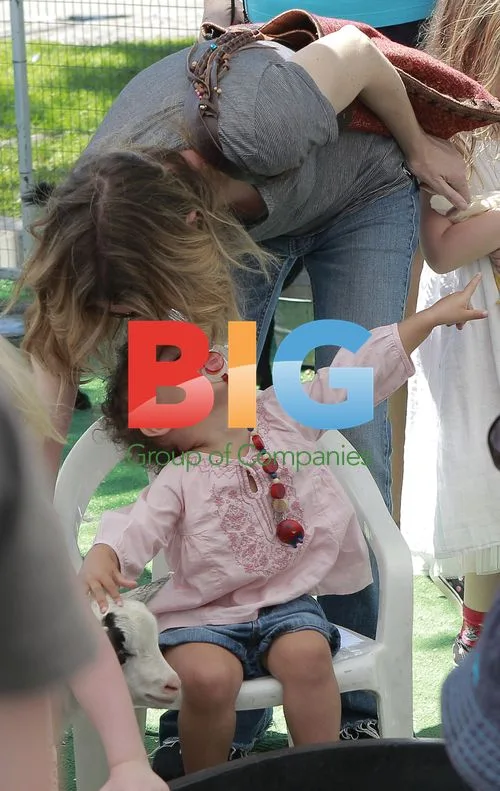 Ellen Pompeo and daughter at petting zoo
