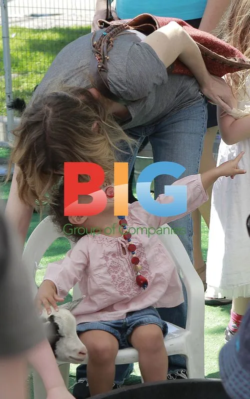 Ellen Pompeo and daughter at petting zoo