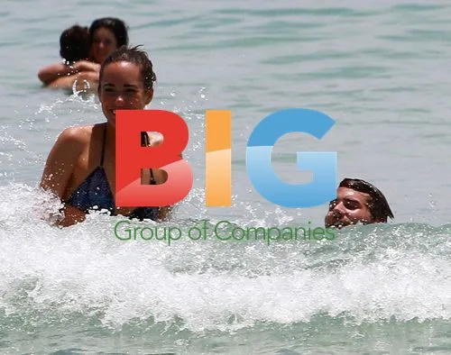 Louise Roe and Josh Slack at the Beach