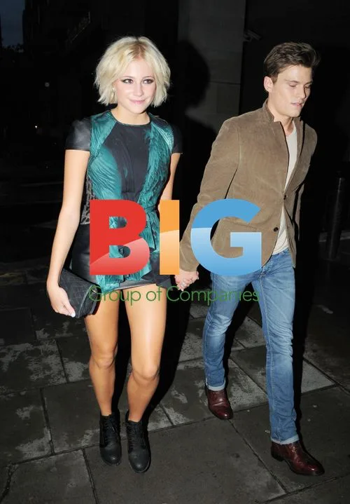 Pixie Lott and Oliver Cheshire at London Party