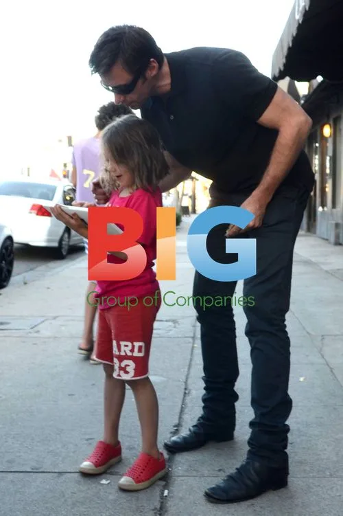 Hugh Jackman and Family Outside Restaurant