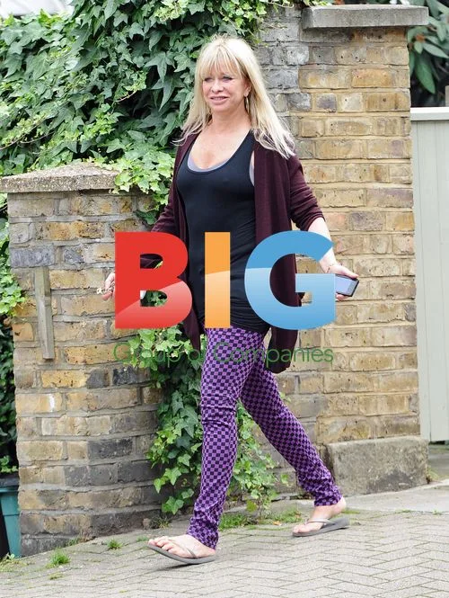 Ronnie Woods Ex Wife Arrives at New Home