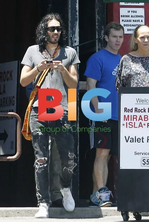 Russell Brand Zips Up in West Hollywood