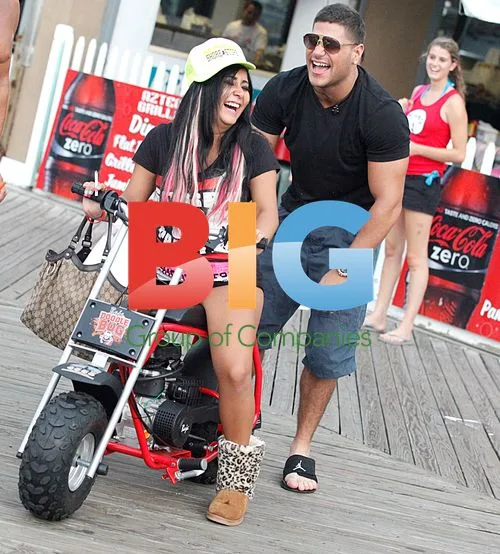 Snooki rides mini motorcycle with Ronnie