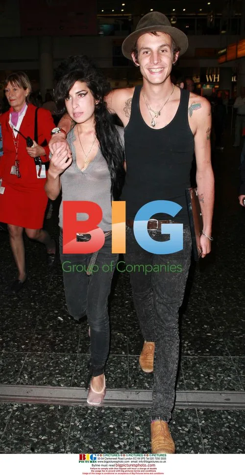 Amy Winehouse and Blake Fielder-Civil Arriving in London