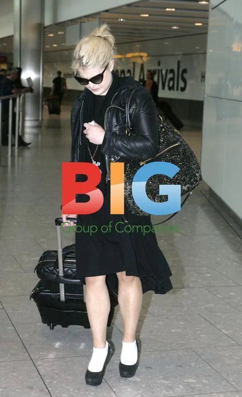 Kelly Osbourne mourns Amy Winehouse in London