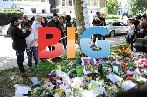 Amy Winehouse's Parents Pay Respects