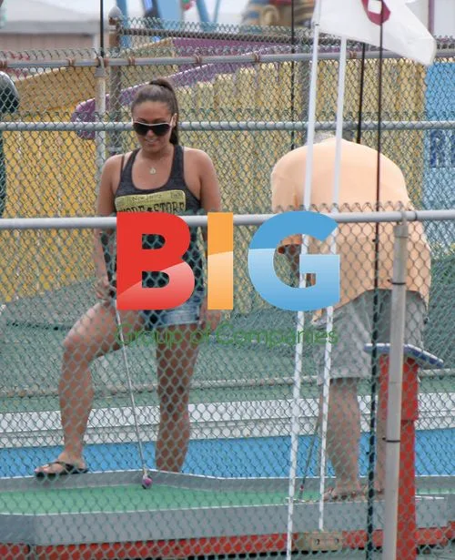 Sammi Giancola mini golf with parents