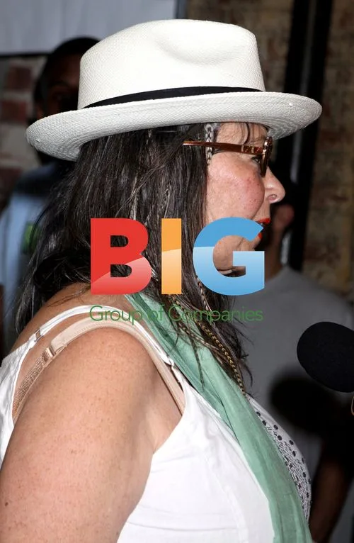 Roseanne Barr with Feather Hair Extensions