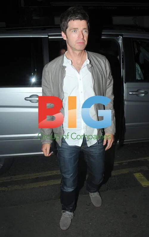 Noel Gallagher and wife at London club