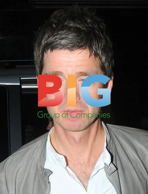 Noel Gallagher and wife arrive at London nightclub