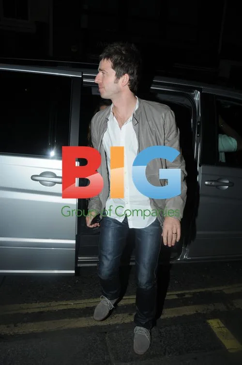 Noel Gallagher and wife at London club