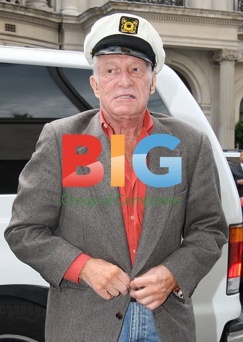 Hugh Hefner and Girlfriends Arriving at London Hotel