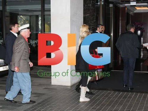 Hugh Hefner with Girlfriends at Hotel