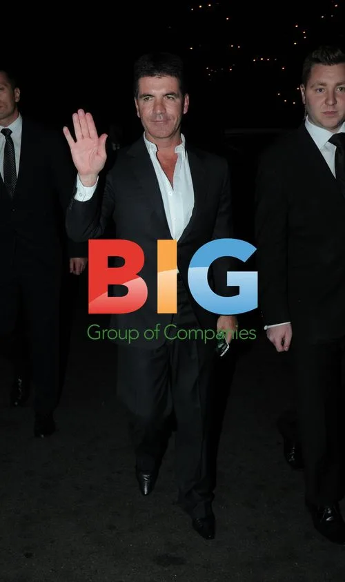 Simon Cowell Hugged in London