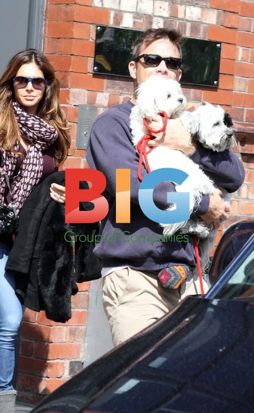 Robbie Williams and Ayda Field Leaving Hotel