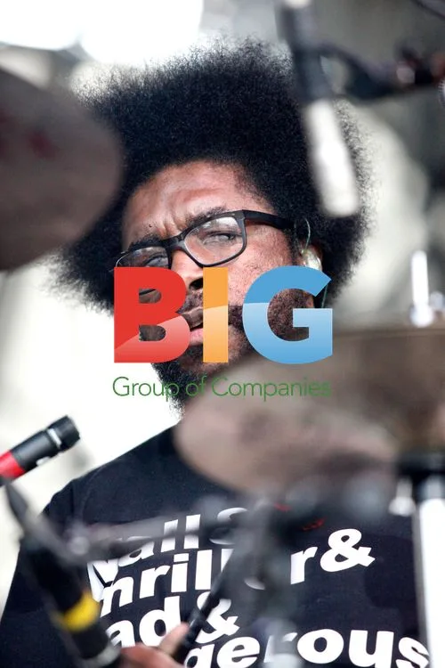 Questlove Performing at Roots Picnic