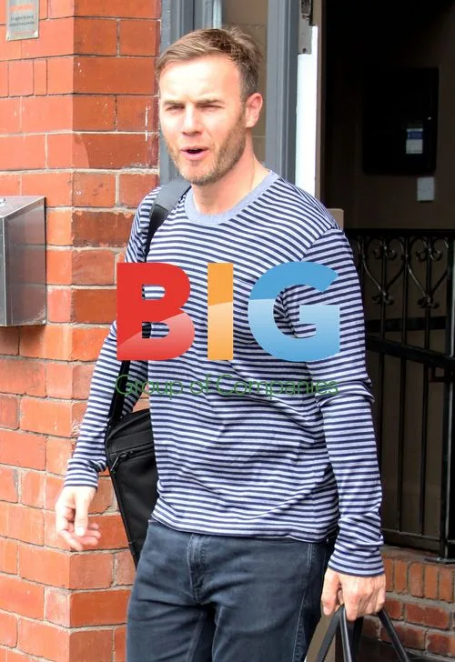 Gary Barlow Leaves Hotel in Manchester