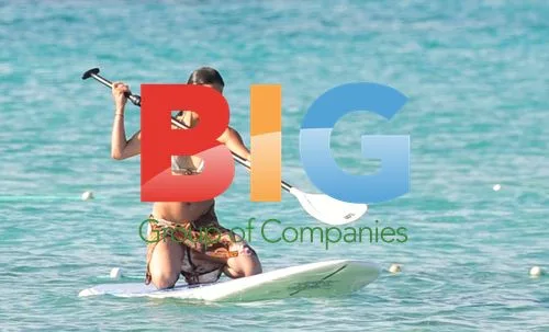 Michele Rodriguez surfing in Formentera