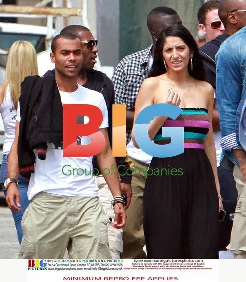 Ashley Cole Enjoys Summer Break with Mystery Woman