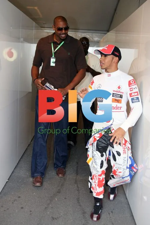Andrew Bynum Meets Lewis Hamilton at F1 Race