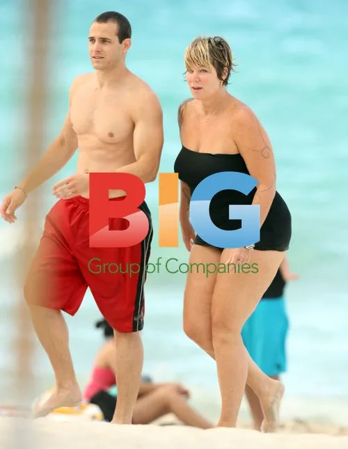 Mia Michaels in Black Swimsuit at Miami Beach