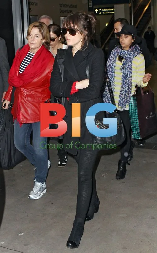 Rose Bryne at Sydney Airport for Bridesmaids Premiere