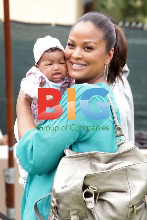 Laila Ali and daughter at AIDS charity event