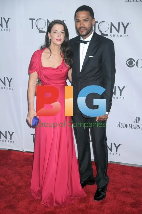 Annabella Sciorra and Maxwell at 2011 Tony Awards