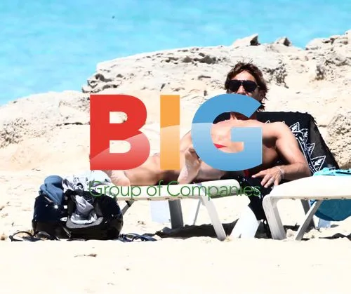 Francesco Totti and Ilary Blasi on beach in Formentera