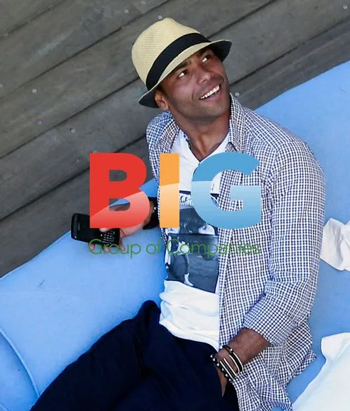 Ashley Cole, Zak Knight and Shaun Wright-Phillips at pool bar in LA