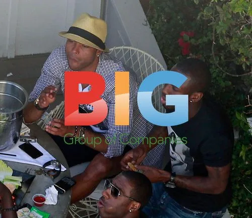 Ashley Cole and friends relax at pool bar