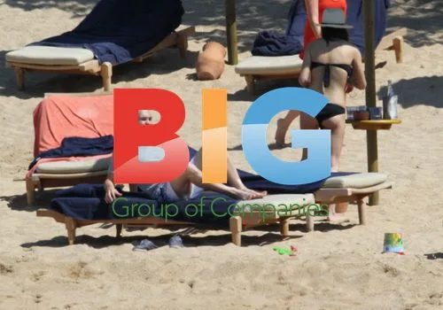 Andres Iniesta and wife on Sardinian beach