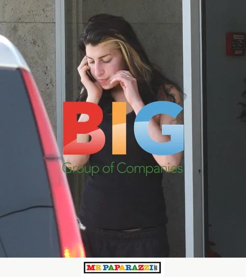 Amy Winehouse Barefoot at Belgrade Airport