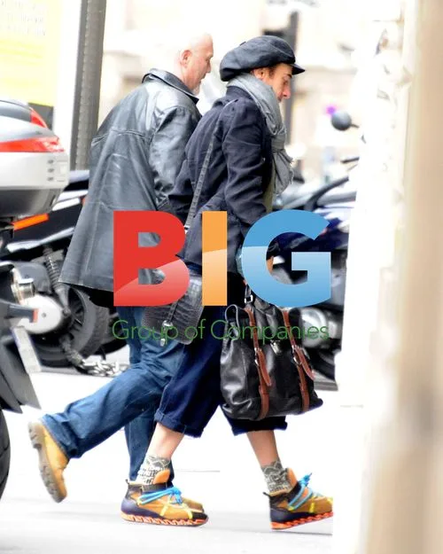 John Galliano and Friend Visit Lawyers Ahead of Court