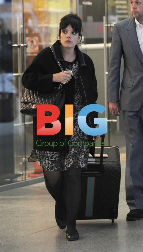 Lily Allen and Sam Cooper Arrive in London