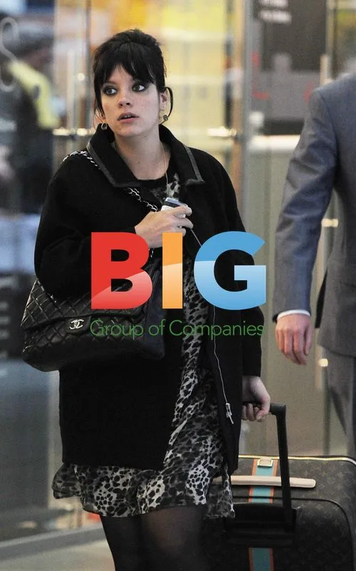 Lily Allen and Sam Cooper Arrive in London